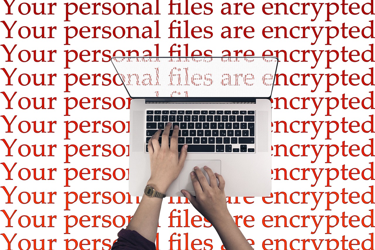 A laptop with a glowing cyber-security padlock graphic